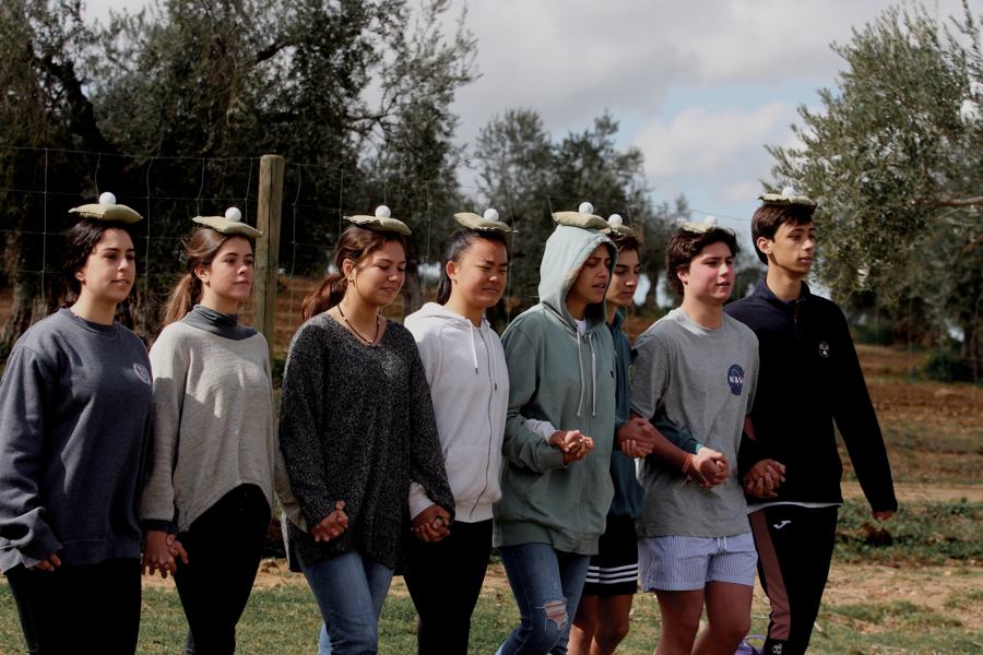 Trainees running an outdoor group activity