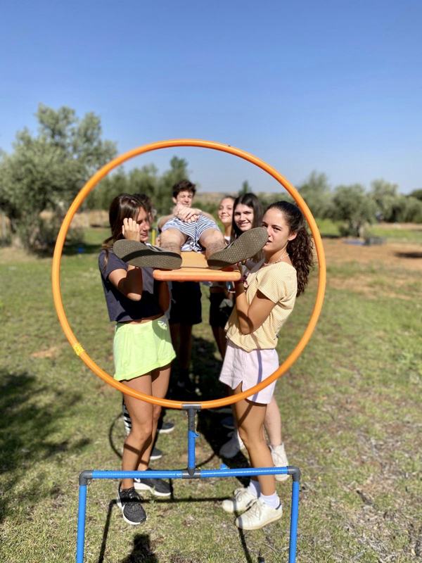 Trainees running an outdoor group activity