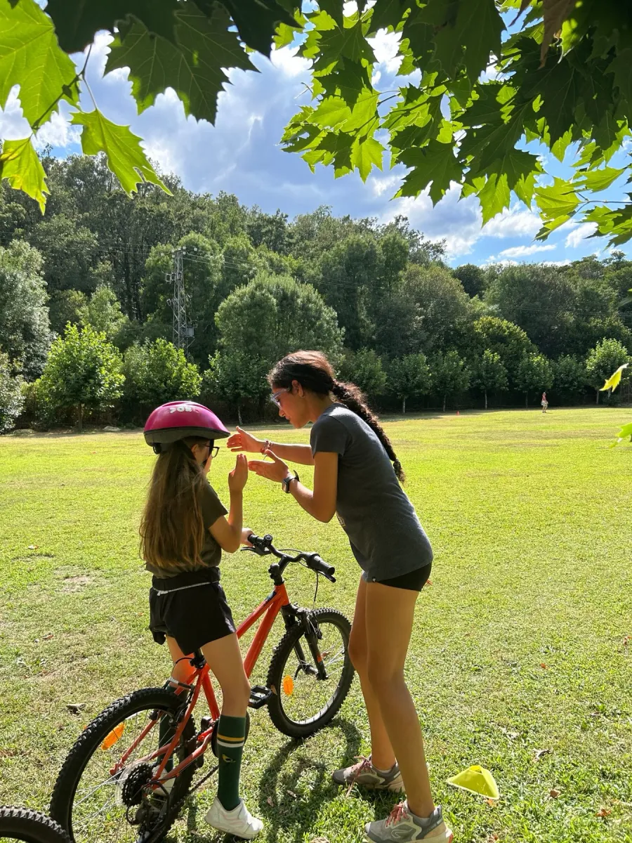 Bike ride across the meadow at the Gredos camp